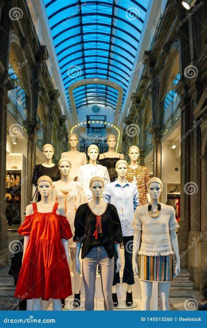 a group of mannequins wearing clothing a group of mannequins wearing clothing