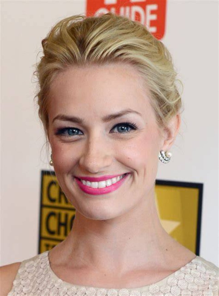 Beth Behrs from 'The Neighborhood' poses for a photo at an event.