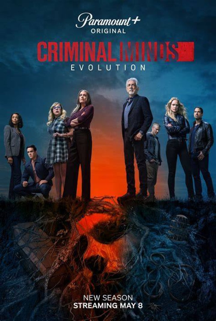 Criminal Minds: Evolution cast and characters: Aisha Tyler as Dr. Tara Lewis, A.J. Cook as Jennifer Jareau, Kirsten Vangsness as Penelope Garcia, Adam Rodriguez as Luke Alvez, Paget Brewster as Emily Prentiss and Joe Mantegna as David Rossi sitting around a table in the BAU office.