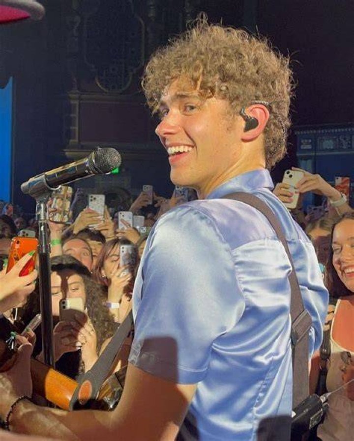 Joshua Bassett in a blue outfit