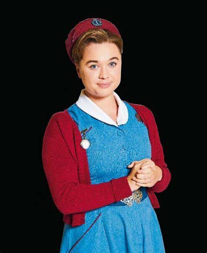 Nancy (Megan Cusack) in her nurse uniform and holding a thermos in 'Call the Midwife' Season 11